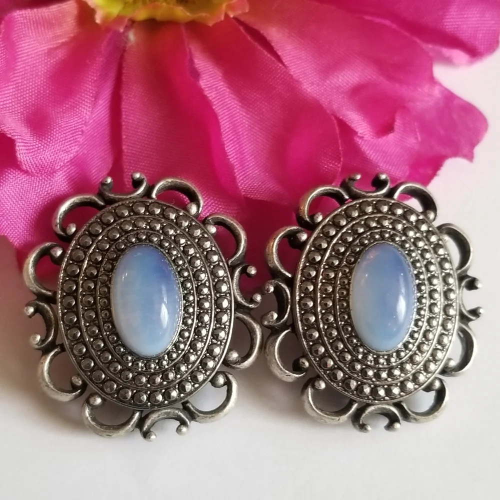 Vintage Kirk's Folly earrings Faux opal silver tone clipon clip back oval